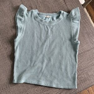 Stylish Knit Top with Ruffled Shoulder